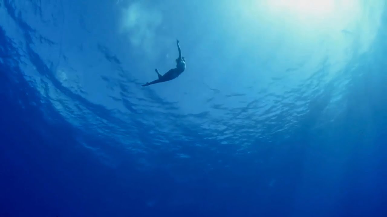 В океане глаз твоих тону